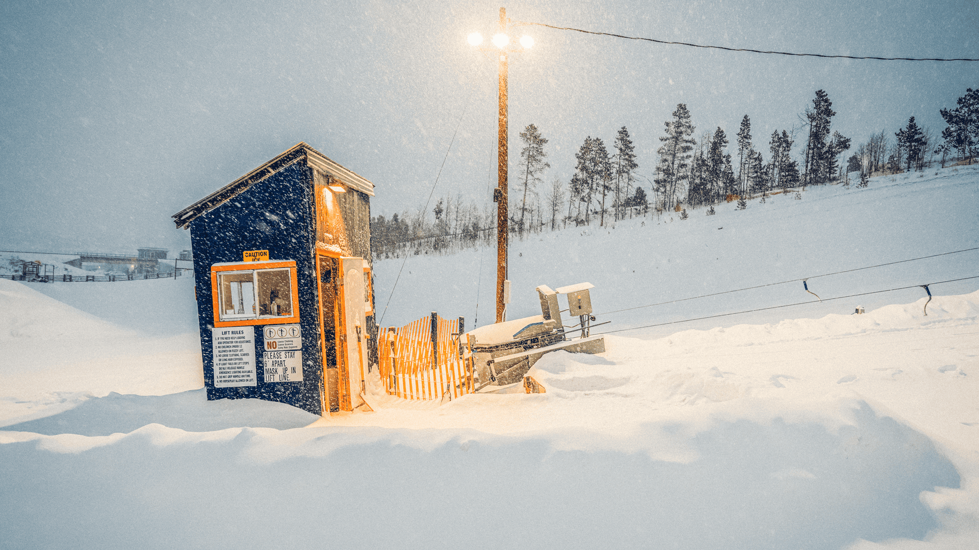 A ski lodge covered in snow.