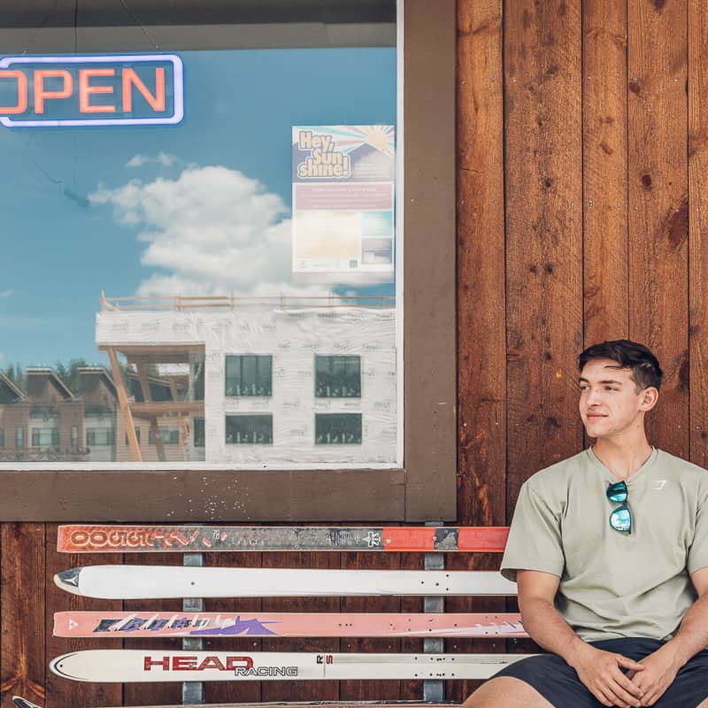 A man sitting on a bench.