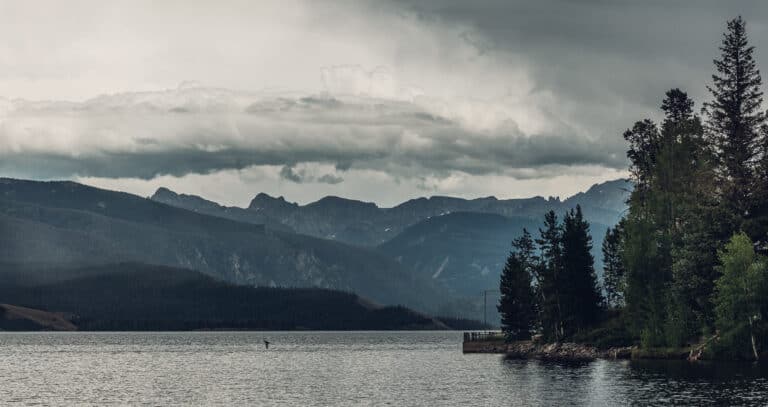 A cloudy sky over a body of water.